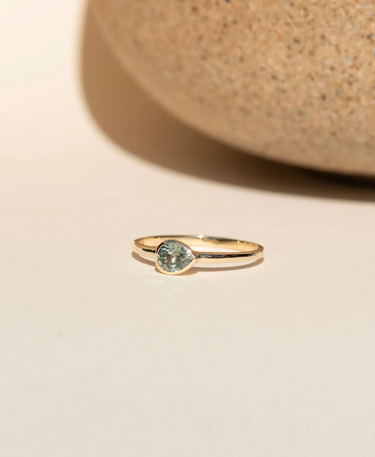Mon Petit Stacker Ring - 9k Yellow Gold, Pear Cut Green Sapphire